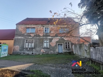 Dom z działką o pow. 6200 m2 w Dąbrowie